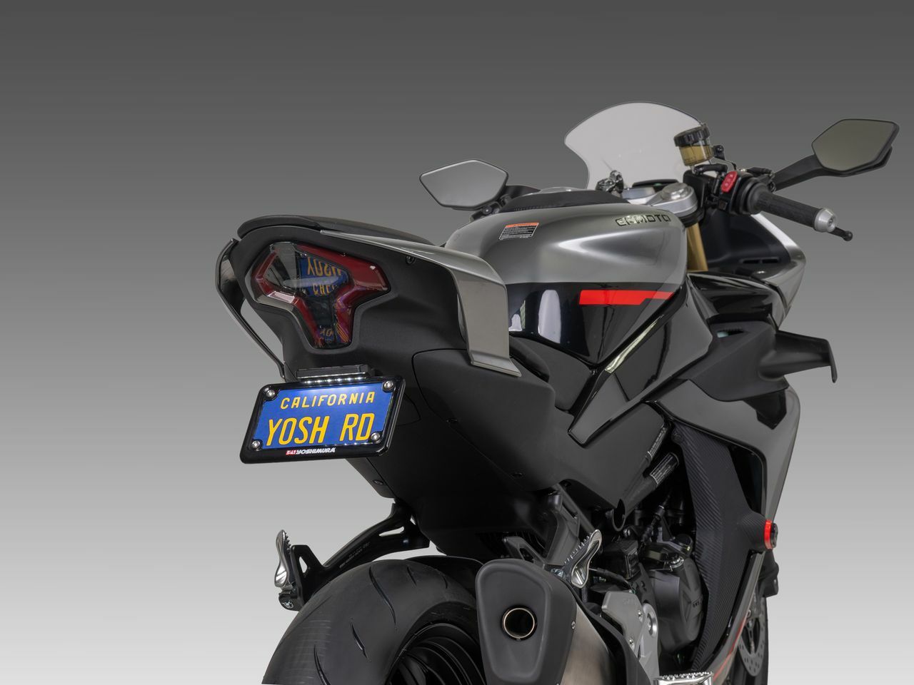 YOSHIMURA Fender Eliminator V2 Base for CF Moto motorcycle, showing sleek black design and mounting bracket.