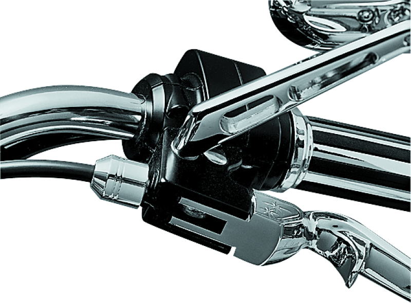 Kuryakyn chrome clutch cable ferrule cover for Harley-Davidson motorcycles, part #2012, shown on a motorcycle handlebar.