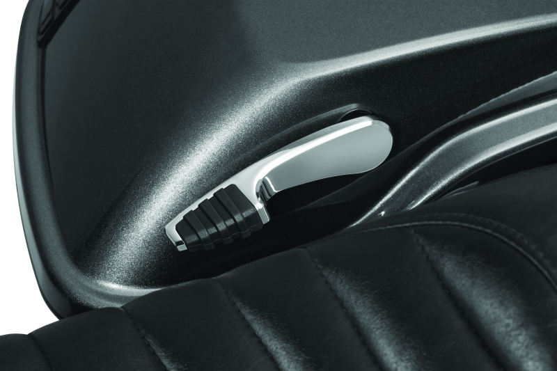 Chrome Kuryakyn Quick Draw Saddlebag Latch Handle for Harley-Davidson Touring Models, part #5192, shown on a motorcycle.