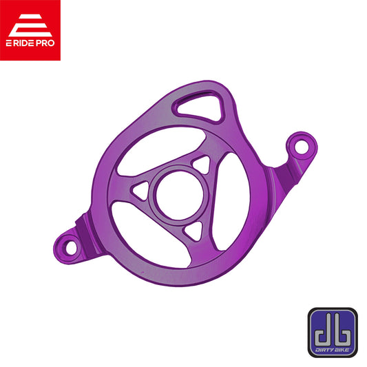 Purple aluminum CNC motor sprocket cover for Surron LBX electric bike, designed by eDirtyBike for durability and style.