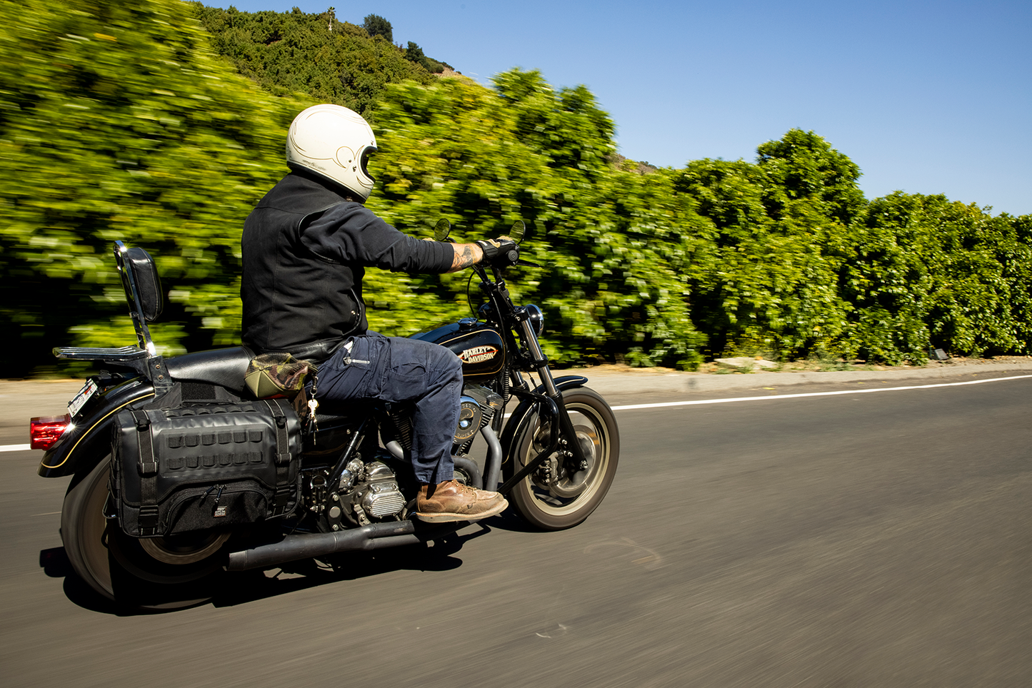 Black BILT WELL EXFIL-36 Saddlebags by Bill's Exhausts, showing durable motorcycle bag with secure straps and sleek design.
