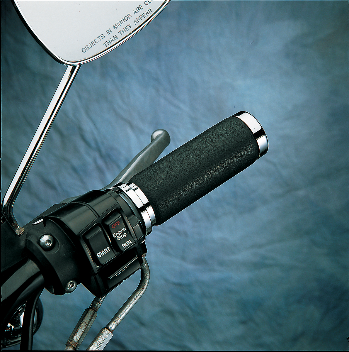 DRAG SPECIALTIES textured black rubber motorcycle grips with chrome end caps, designed for comfort and style.