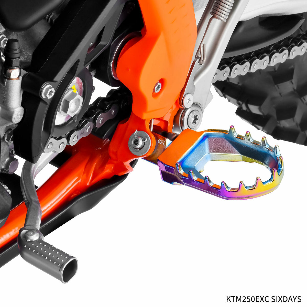 ZETA Max motorcycle foot peg in oilslick finish, heavy-duty chrome-moly steel, with textured grip surface for secure footing.
