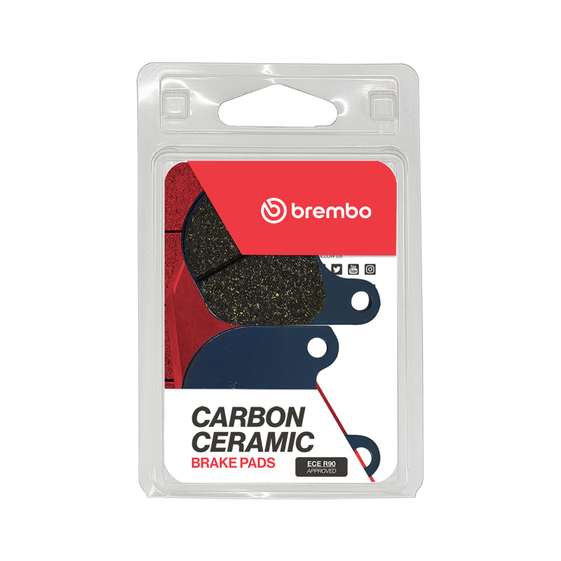 Brembo OE Powersports front brake pad for Harley-Davidson XLH 883cc, showing the brake pad with Brembo branding and mounting surface.