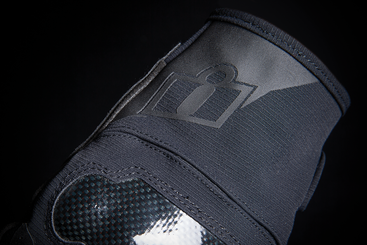 Black ICON Stormhawk™ gloves in 3XL size with reinforced palms and knuckles, designed for durable protection and comfort.