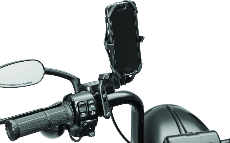 Kuryakyn Free-Flex Device Holder perch mount attached to powersports vehicle handlebar showing secure grip and adjustable positioning