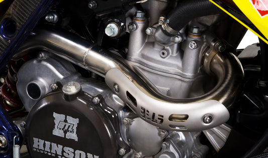 YOSHIMURA Signature RS-5 full system UTV exhaust with polished stainless steel finish and sleek design.