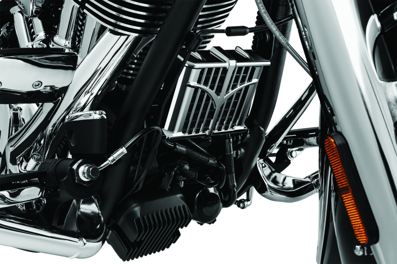 Kuryakyn chrome oil cooler cover for 2014-2023 Indian motorcycle models, showcasing a sleek protective accessory.