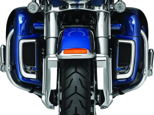 Chrome Kuryakyn Tracer Lower Fairing Grill for Harley Davidson Touring models, showcasing the sleek, reflective finish and detailed design.