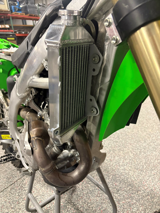 FIRE POWER TRS-R-140R radiator right for Kawasaki motorcycle, high-performance aluminum replacement with cooling fins and mounting points.