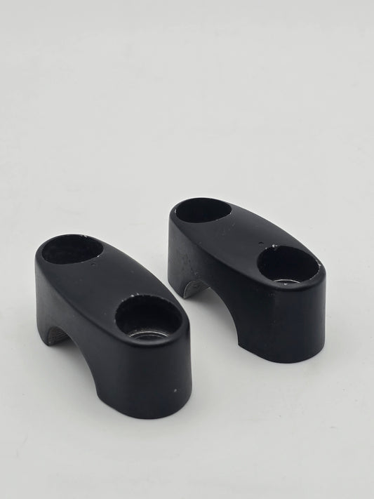 Used Honda Grom OEM handlebar mounts, pair of handlebar holders for models 2014-2020, durable motorcycle handlebar mounts.