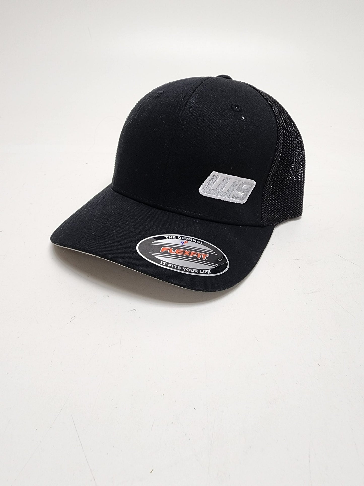 Warp9 Fitted Hat by WarpWear featuring a stylish design, perfect for racing fans and casual wear.