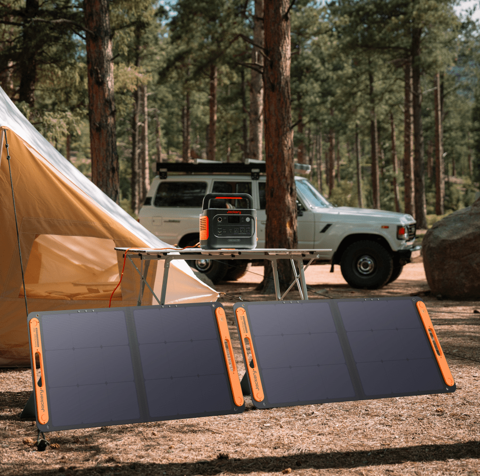 Jackery Solar Generator 1000 v2 with portable design, multiple outlets, and solar panels for renewable energy backup.