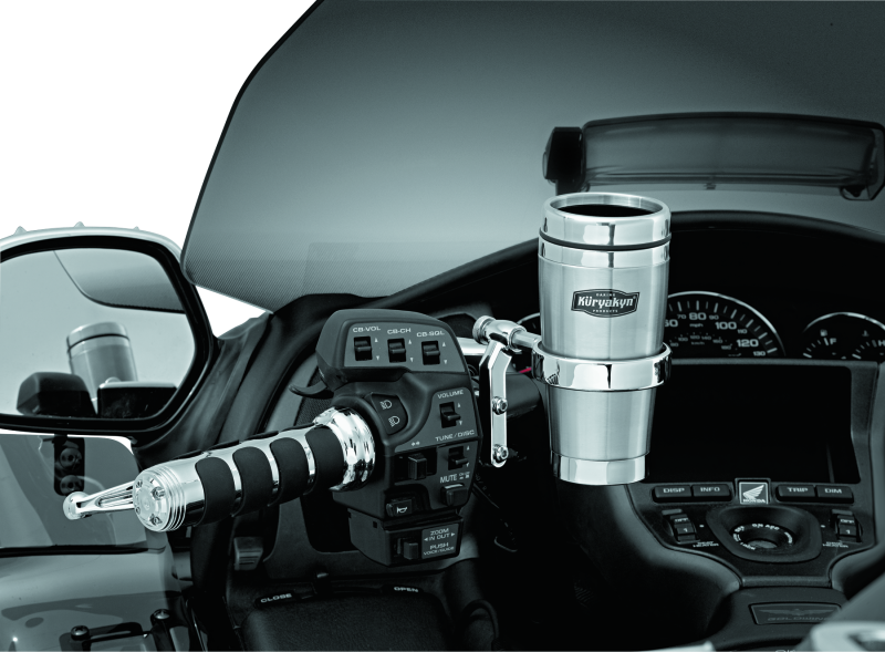 Kuryakyn chrome drink holder with stainless steel mug mounted on a motorcycle perch for convenient hydration.