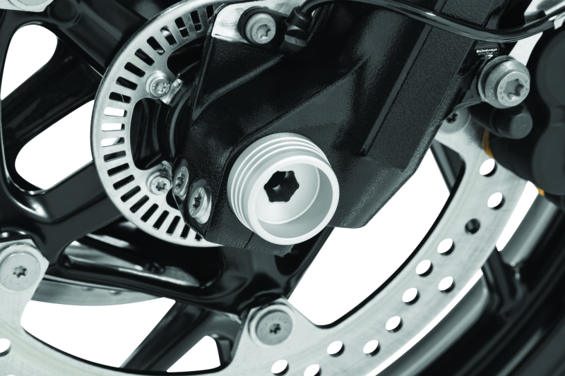 Kuryakyn Lodestar front axle slider in silver for BMW R1200R, R1200RS, and F800R motorcycle, showing the sleek protective part.