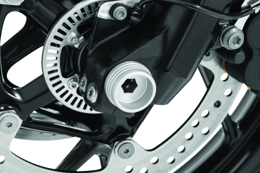 Kuryakyn Lodestar front axle slider in silver for BMW R1200R, R1200RS, and F800R motorcycle, showing the sleek protective part.