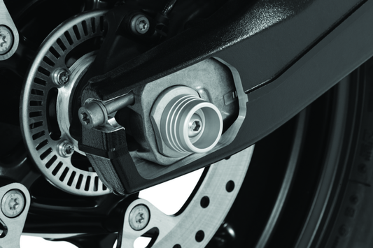 Kuryakyn Lodestar rear axle slider for BMW S1000RR and HP4 models, showing black protective motorcycle part on a bike.