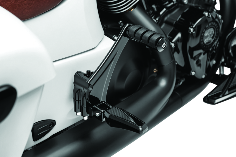 Kuryakyn passenger peg mounts for Indian Motorcycle models in gloss black, part 5830, with mounting hardware visible.