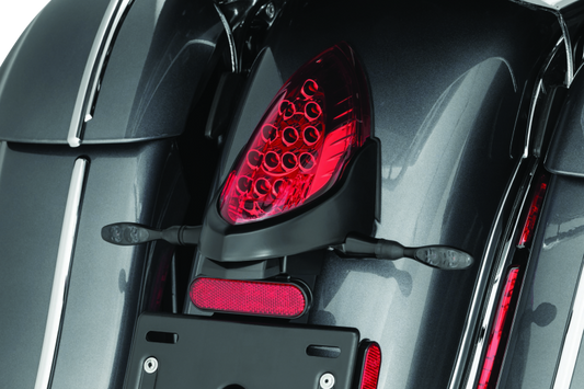 Kuryakyn rear turn signal and license plate mount for Indian motorcycles, part 3129, shown installed on the bike.