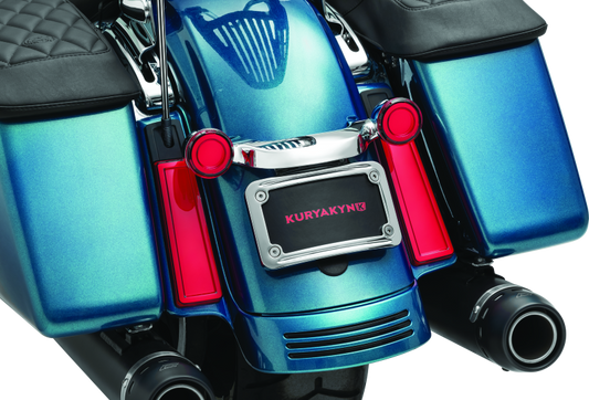 Kuryakyn Tracer Filler Panel Lights with red lens, custom LED accent for motorcycle saddlebags, enhances visibility and style.