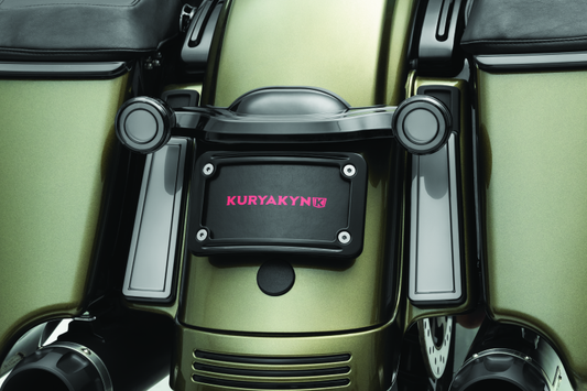 Kuryakyn Tracer Filler Panel Lights with Smoke Lens installed on Harley-Davidson saddlebags, showcasing sleek, modern lighting details