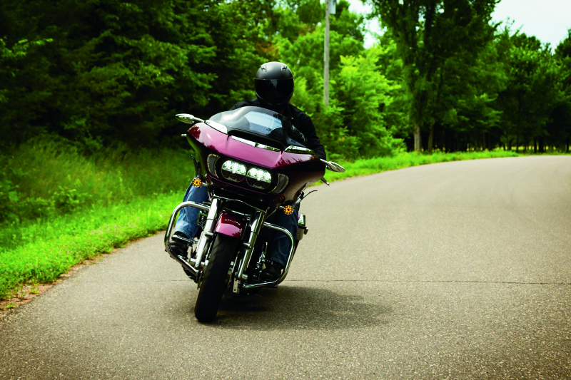 Kuryakyn chrome windshield side trims for Harley-Davidson Road Glide 2015-2021, shown on a motorcycle.