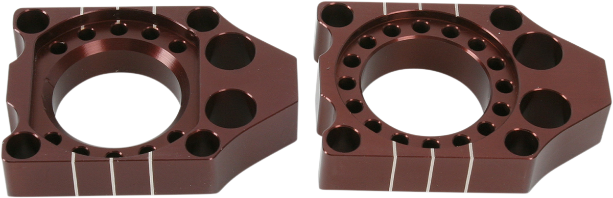 Pro Circuit KAB03 CNC machined aluminum axle blocks for Kawasaki and Suzuki motorcycles, featuring precise machining and durable construction.