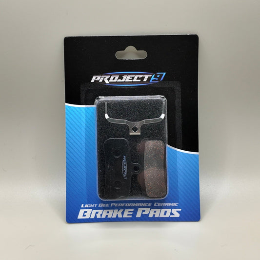 Project 9 Performance Brake Pads for Talaria MX3 & MX4, ceramic and sintered brake pads, shown in close-up.