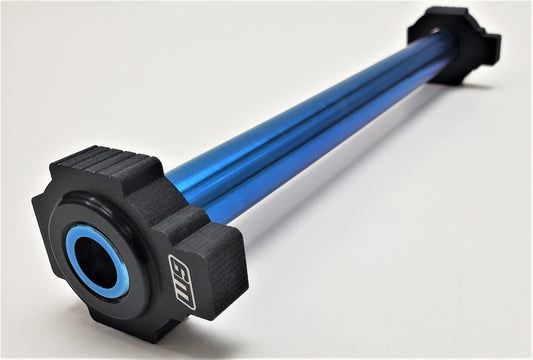 Warp9Racing titanium rear axle for KTM 125 SX (2007-2012), showcasing a lightweight, durable motorcycle axle with precision engineering.