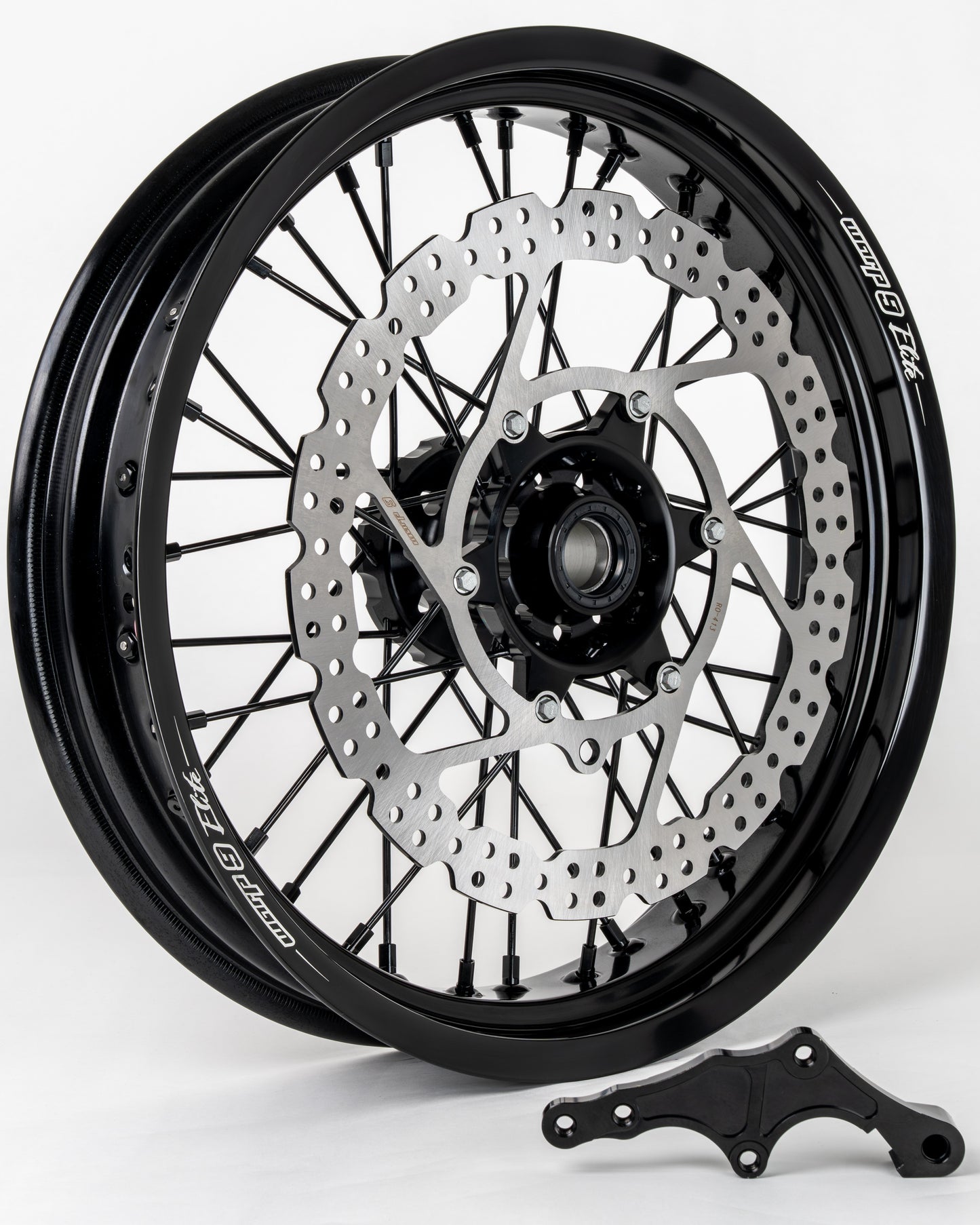 Warp9Racing 17-inch KTM front wheel in orange, black, and silver with a durable alloy design, ready for off-road or motocross use.