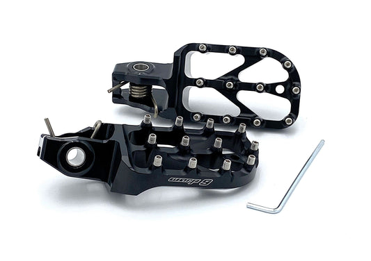 Warp9Racing Stark Varg Elite Foot Pegs in silver, motorcycle foot pegs for enhanced grip and control.