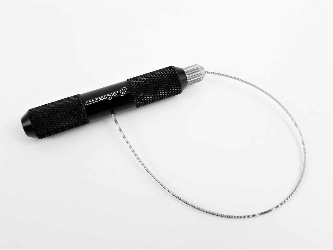 Warp9Racing valve stem puller tool for easy removal and installation of valve stems in automotive or bicycle tires.