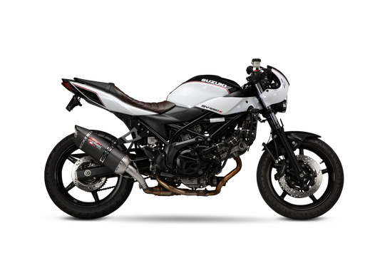 YOSHIMURA RS-12 ADV motorcycle exhaust with polished metal finish and branding, designed for enhanced performance.