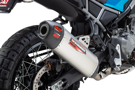 YOSHIMURA RS-12 ADV slip-on exhaust system for off-road vehicles, showing the sleek metallic muffler with branding.