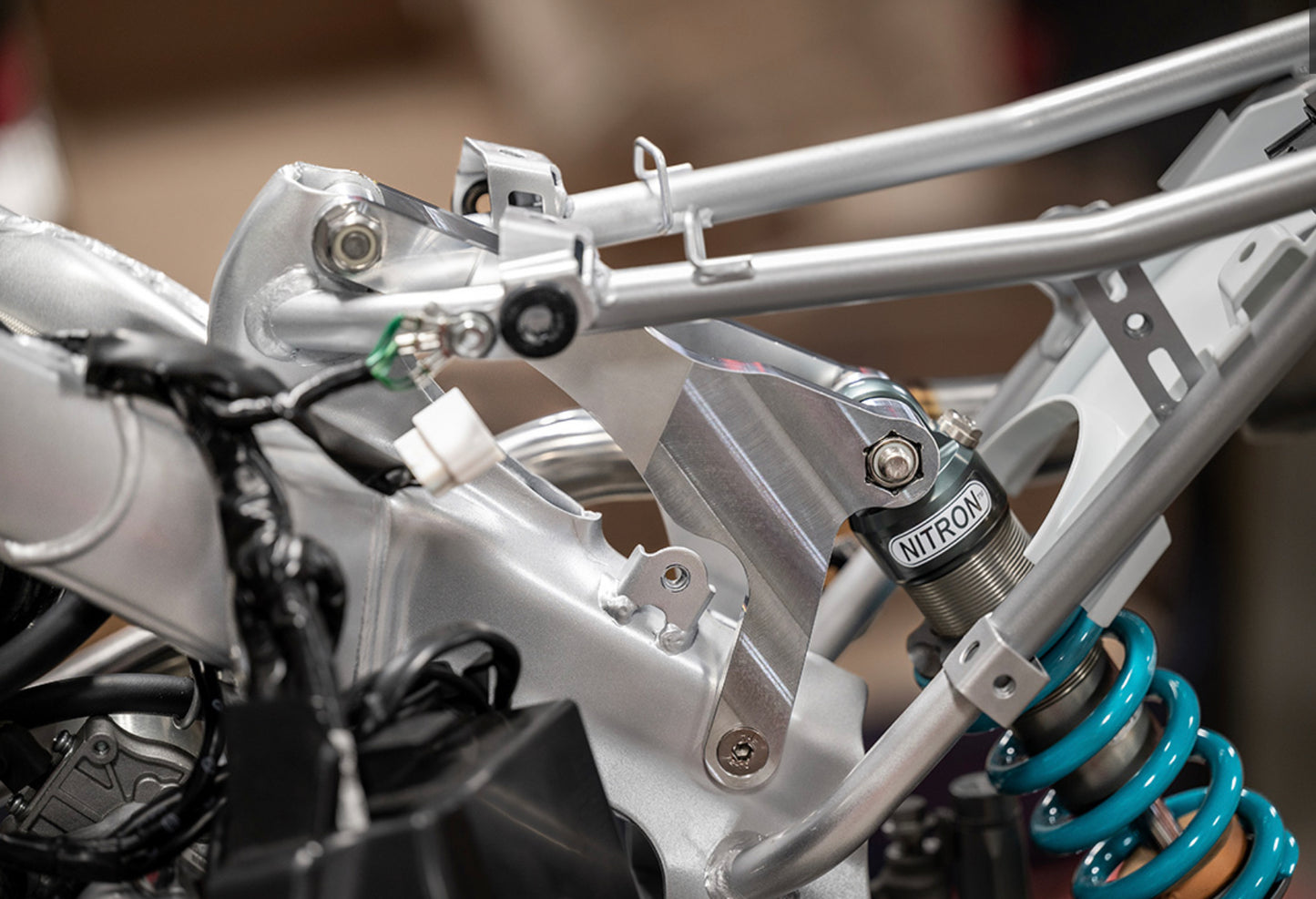 MNNTHBX CRF SHOCK MOUNT FOR GROM SHOCK - Howling Moto