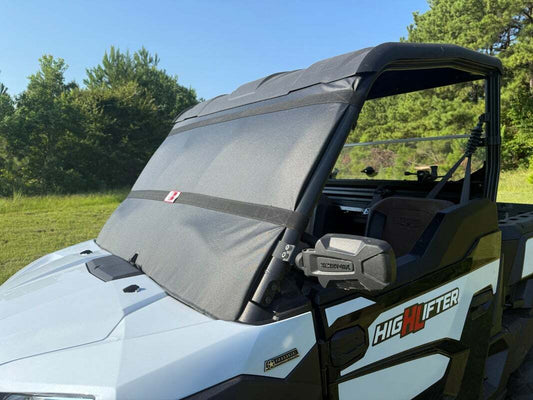 SEIZMIK Kawasaki windshield protector mounted on off-road vehicle, durable clear windshield for added protection