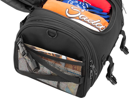 Bill's Exhausts SADDLEMEN TR2300DE TL sissy bar bag mounted on motorcycle seat, featuring durable straps and spacious storage capacity.