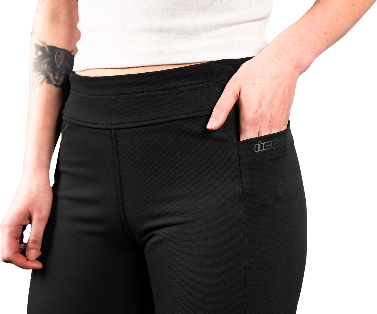 ICON Women's Tuscadero2™ black stretch pants by Bill's Exhausts, small size, shown on a model with a close-up of the fabric.