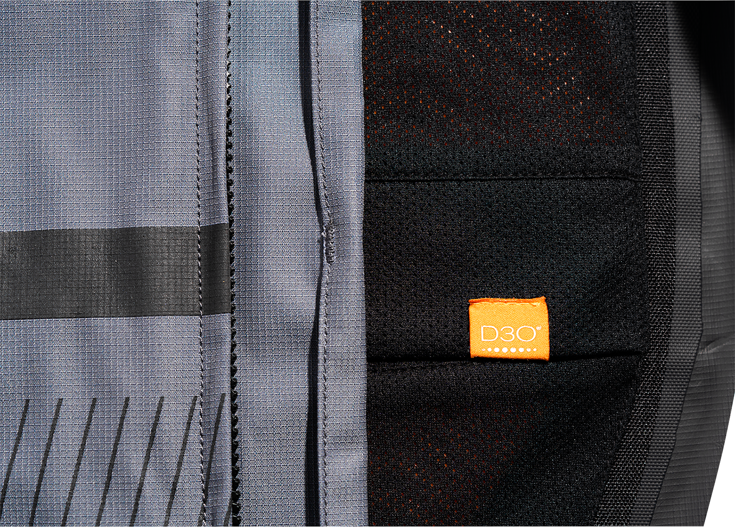 Gray ICON PDX3™ jacket in medium size, featuring a sleek design with front zipper and logo details, by Bill's Exhausts.