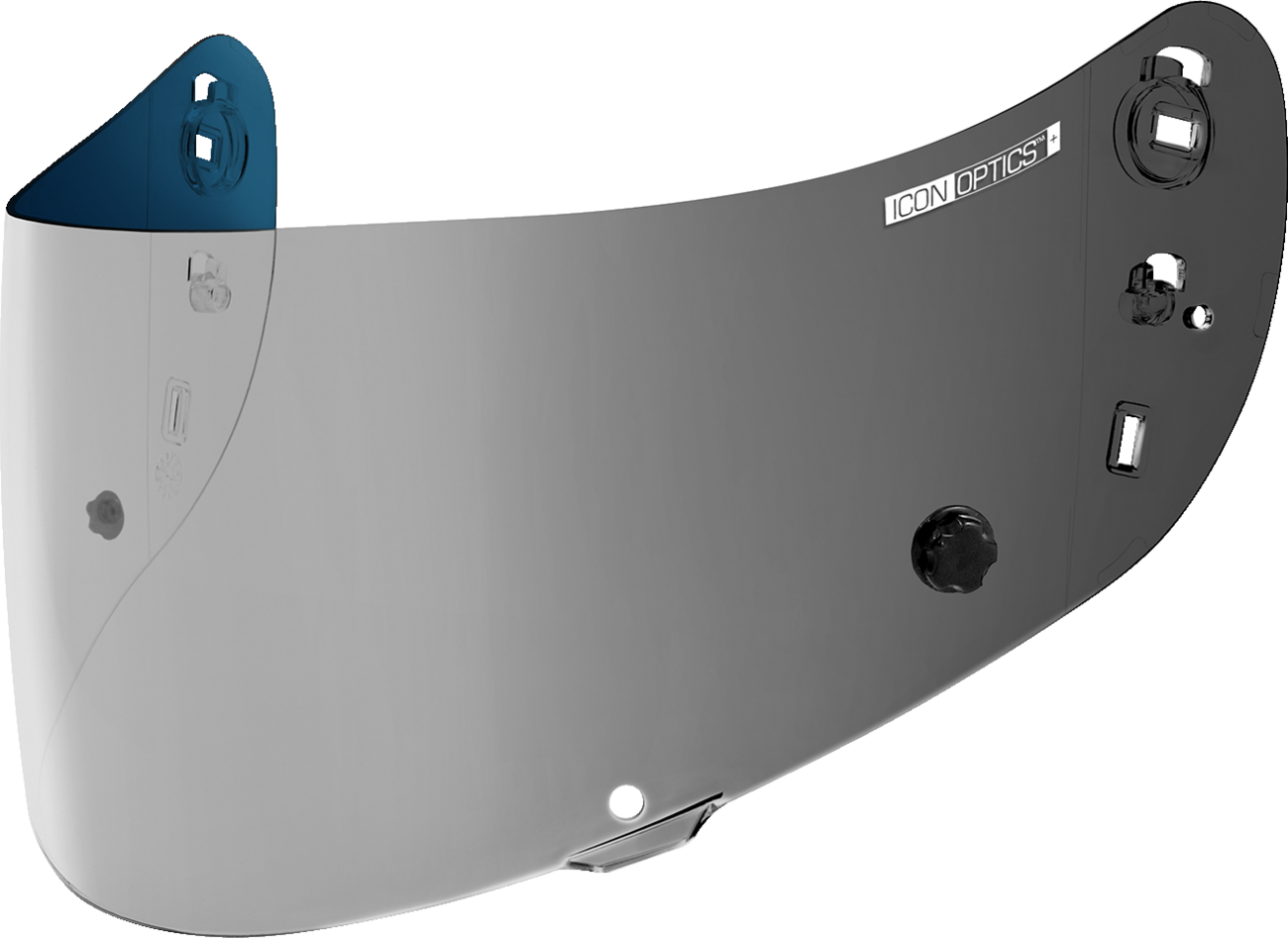 Close-up of ICON Optics™ Tracshield™ helmet part in silver, showing detailed design and branding for motorcycle helmet protection.