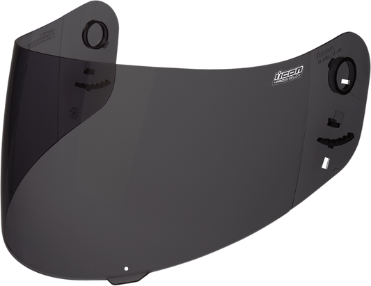 Dark smoke ICON Proshield™ helmet face shield for helmets parts by Bill’s Exhausts, showing tinted shield with reflective finish.