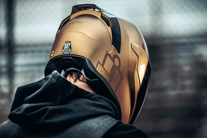 Bill's Exhausts ICON Airflite Jewel MIPS Gold helmet in small size, featuring a sleek design and protective safety features.