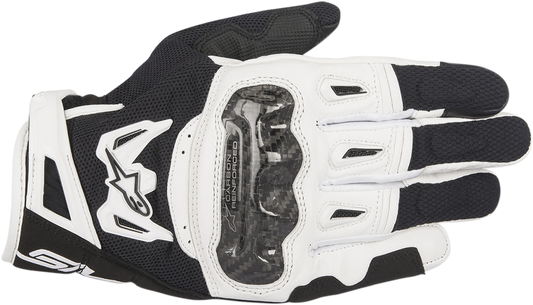 Alpinestars SMX-2 Air Carbon V2 motorcycle gloves in black and white, medium size, featuring protective carbon fiber details.