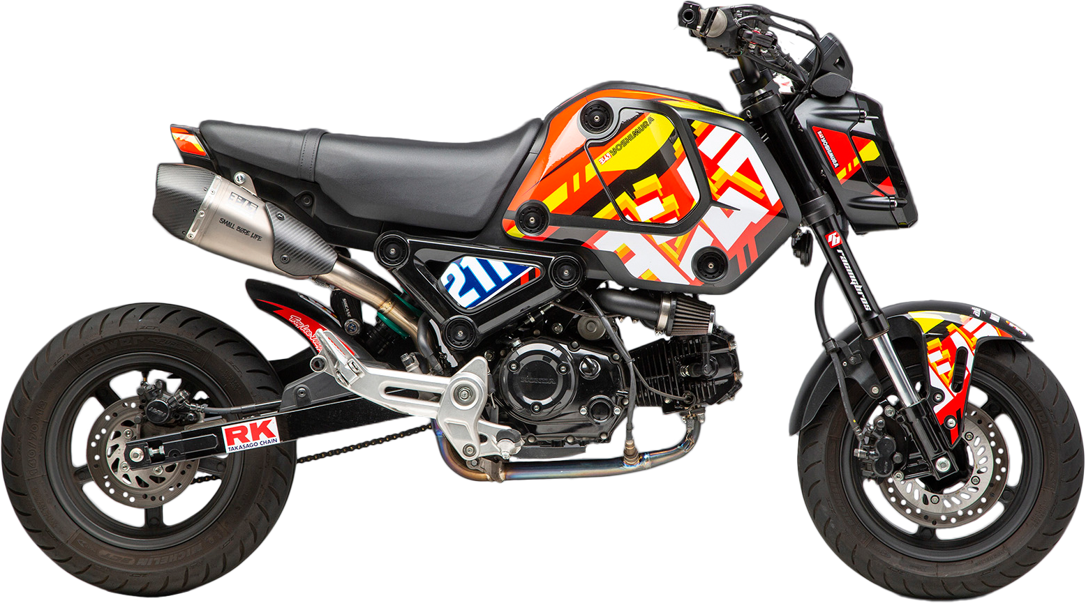 YOSHIMURA P7 TLD HON graphic kit with custom racing graphics and 54 logo on a motorcycle.