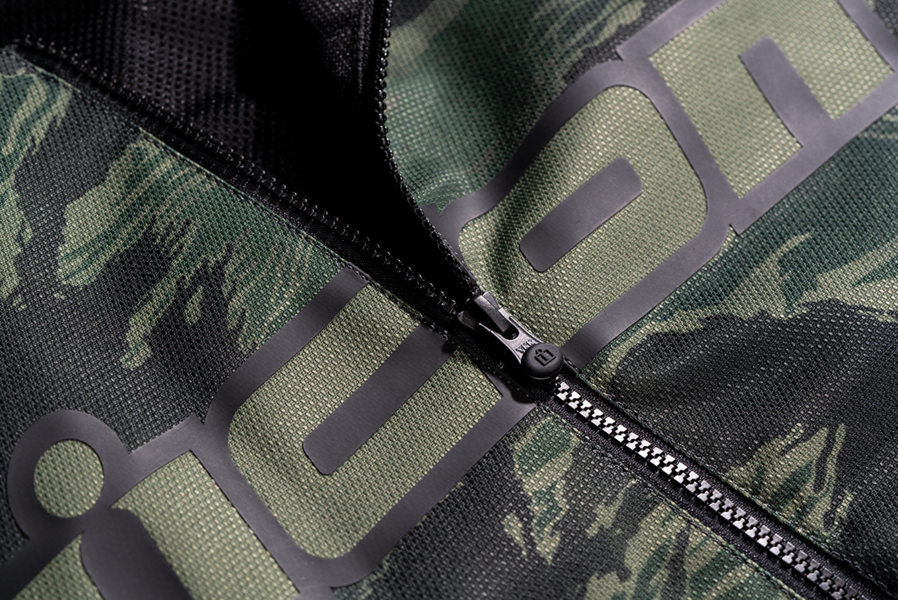 Green ICON Hooligan CE Tiger's Blood Jacket in Small size, featuring bold design and protective gear, by Bill's Exhausts.
