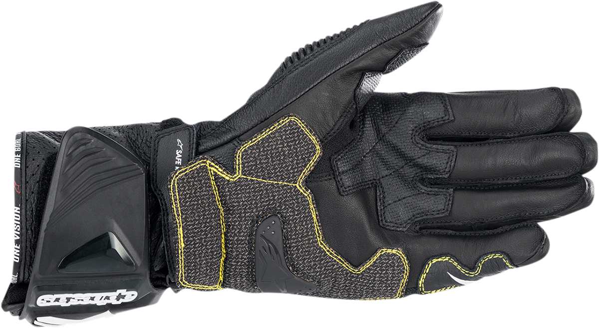 Black and white ALPINESTARS GP Tech v2 motorcycle gloves in XL size, featuring protective padding and adjustable wrist straps.