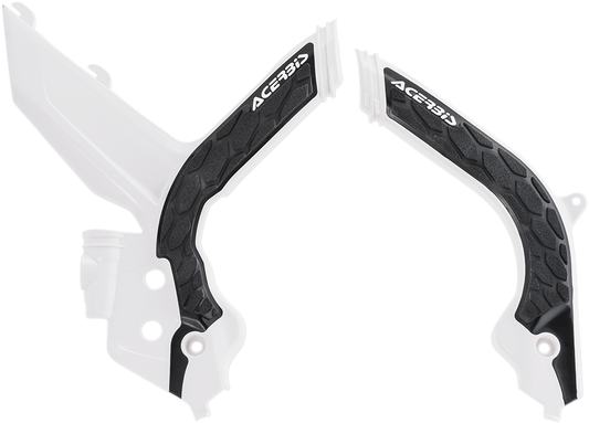 Acerbis X-Grip frame guards in white and black, designed to protect motorcycle frames, shown on a body panel.