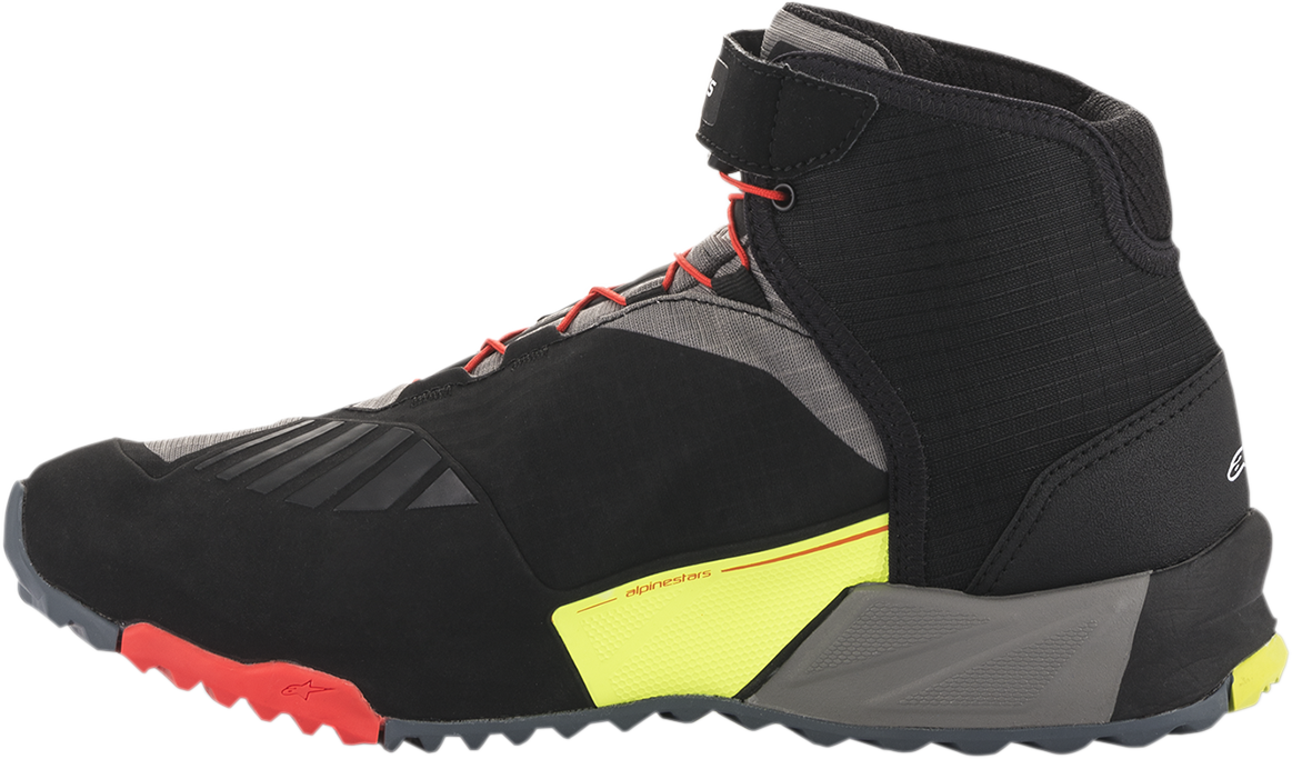 Alpinestars CR-X Drystar® motorcycle shoes in black, red, and yellow fluorescent with US 9.5 size, featuring durable design and protective details.