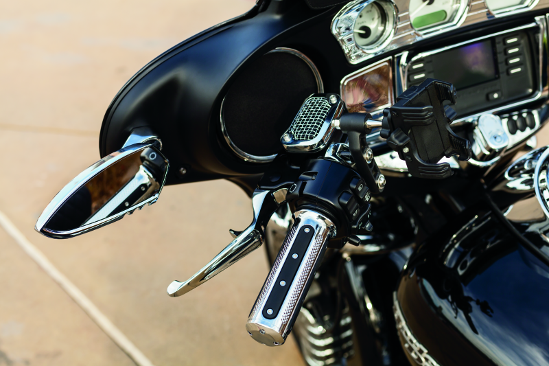 Kuryakyn chrome trigger levers for 2014-2016 Harley-Davidson touring motorcycles, showing shiny chrome finish and ergonomic design.