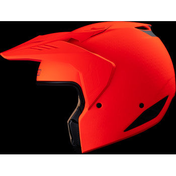 Red ICON Elsinore™ helmet in medium size, featuring a sleek design and Monotype finish, displayed from a side angle.